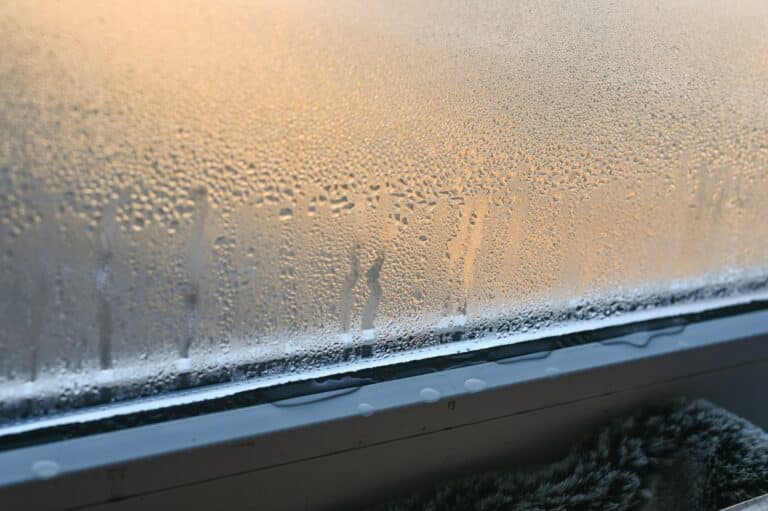 plastic window with water condensation on the glass